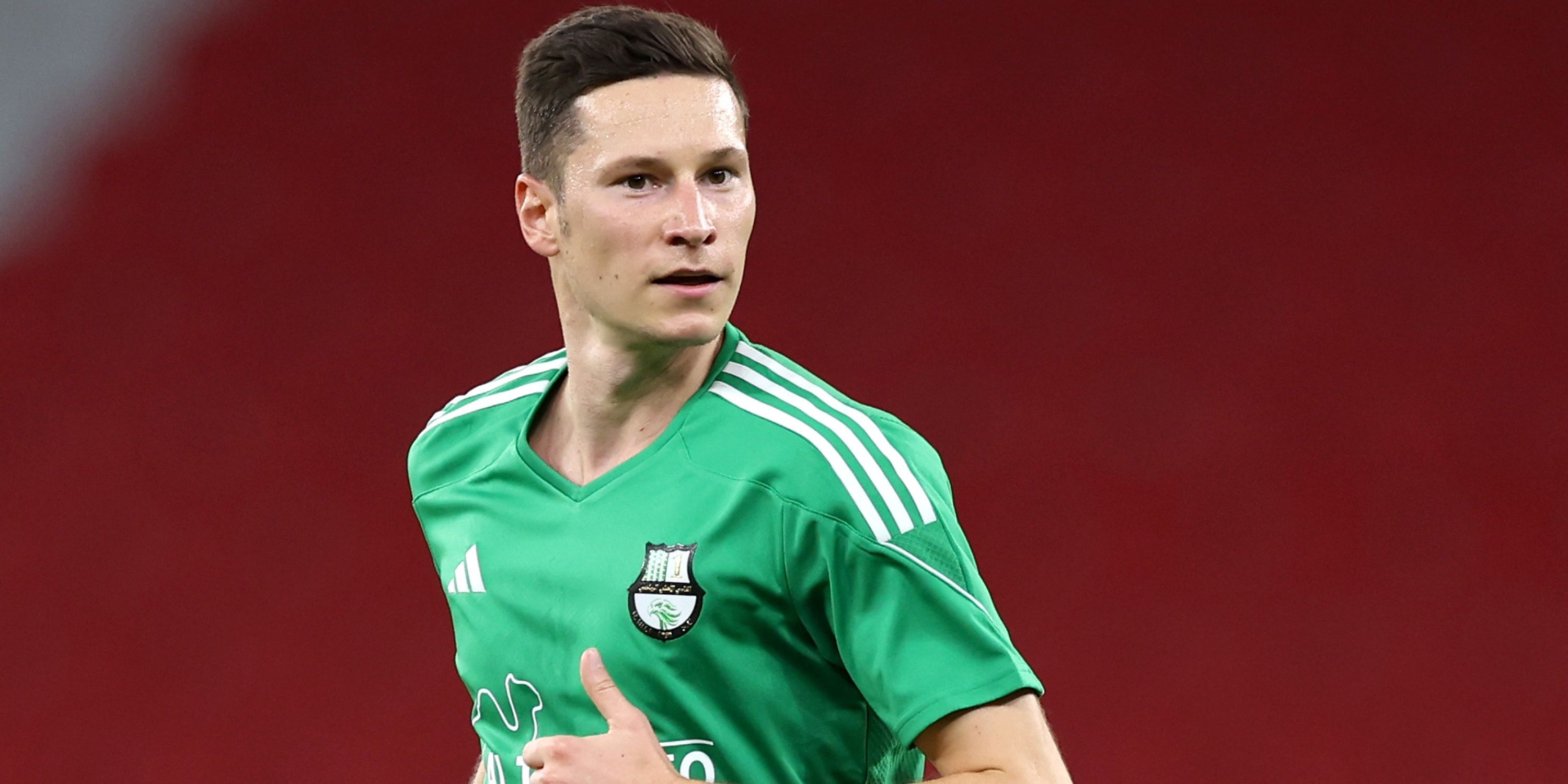 Julian Draxler trong trận đấu với Al-Ahli SC